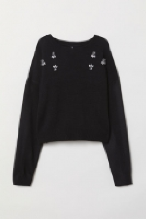  Pull à motif 16.99 €