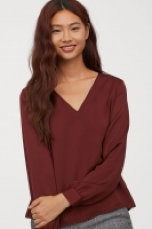  Blouse à encolure en V 19.99 €