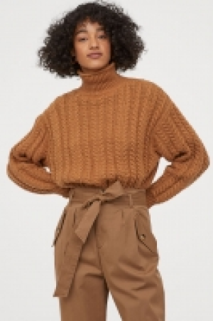  Pull en maille torsadée 14.99 €