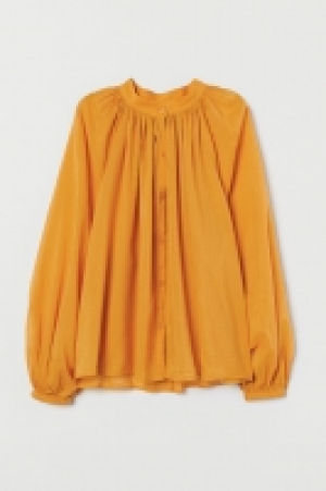  Blouse ample 12.99 €