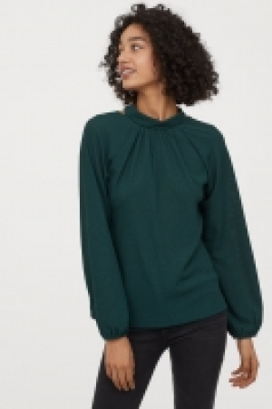  Blouse avec col à nouer 10.99 €