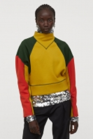  Top color block façon néoprène 24.99 €