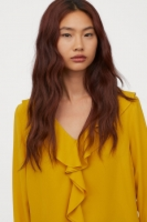  Blouse à encolure en V 17.99 €