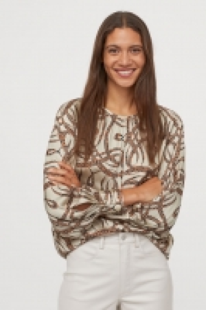  Blouse en satin à motif 11.99 €