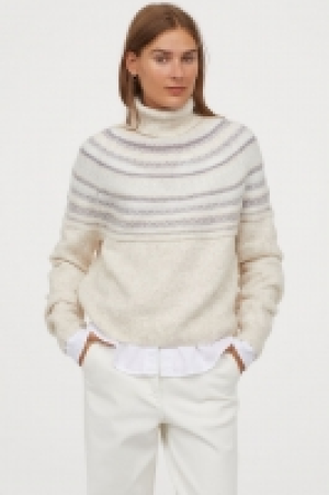  Pull col roulé jacquard 14.99 €
