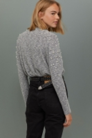  Pull avec perles fantaisie 9.99 €