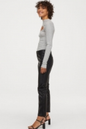  Top col roulé côtelé 12.99 €