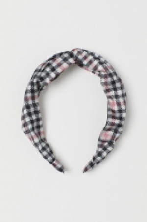  Serre-tête avec détail noué 3.99 €