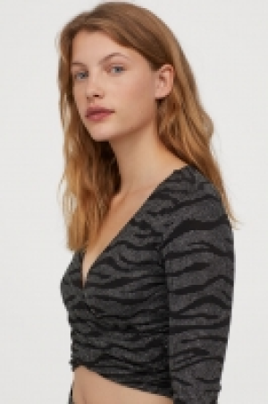  Top en V scintillant 6.99 €