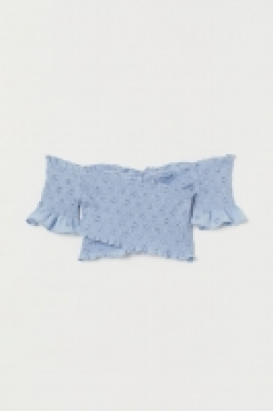  Top épaules nues smocké 17.99 €