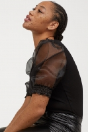  Top à manches bouffantes 8.99 €