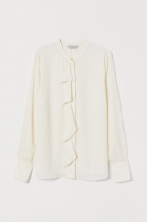  Blouse volantée 12.99 €