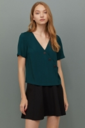  Blouse à encolure en V 6.99 €