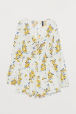  Combi-short avec détail noué 18.99 €