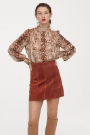  Jupe courte en suède 28.99 €