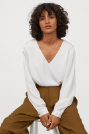  Blouse à encolure en V 13.99 €