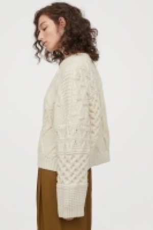  Pull en maille torsadée 18.99 €