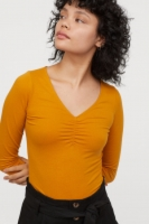  Top à encolure en V 5.99 €