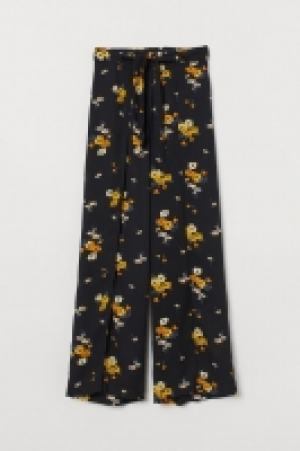  Pantalon avec fentes montantes 9.99 €