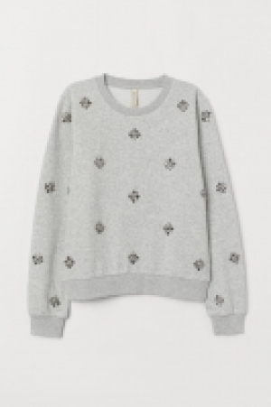  Sweat avec applications 11.99 €