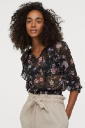  Blouse vaporeuse à volants 8.99 €