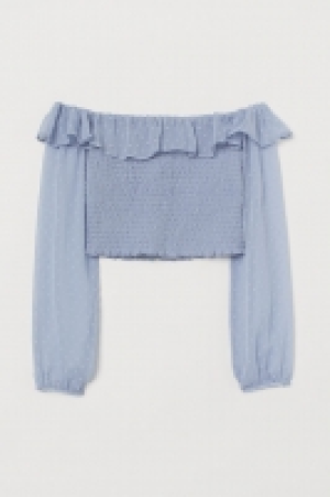  Top épaules nues smocké 13.99 €