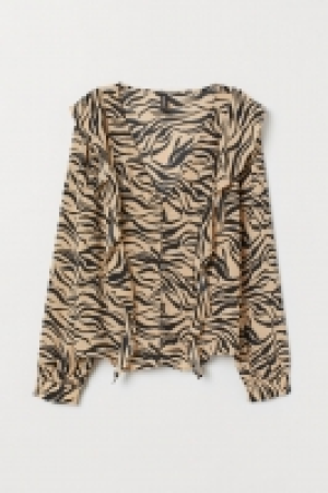  Blouse volantée 6.99 €