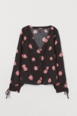 Blouse à boutons 6.99 €