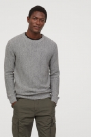  Pull en maille texturée 16.99 €
