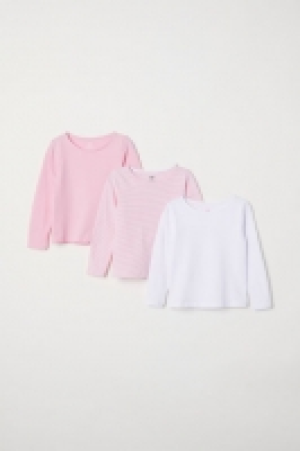 3 tops à manches longues 10.99 €
