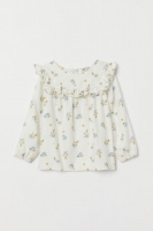  Blouse volantée 5.99 €