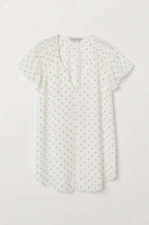  Top à manches volantées 6.99 €