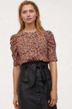  Blouse à manches bouffantes 9.99 €