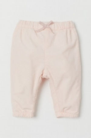 HM   Pantalon en velours doublé
