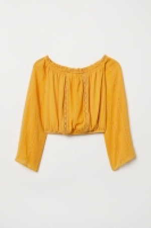  Blouse épaules nues courte 17.99 €