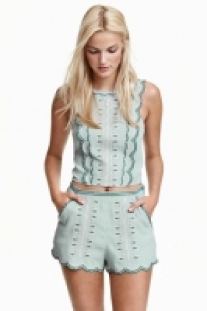  Short brodé 13.99 €
