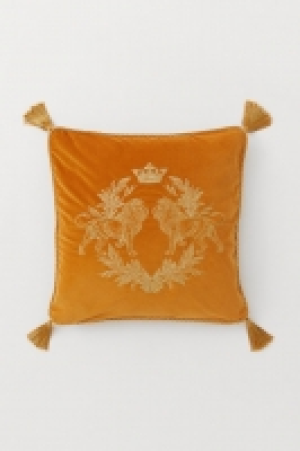 HM   Housse de coussin à pompons