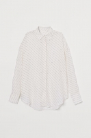 Blouse en lyocell mélangé 13.99 €
