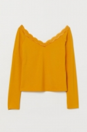 Top épaules nues 6.99 €