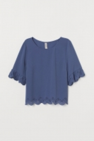 Top à bord festonné 8.99 €