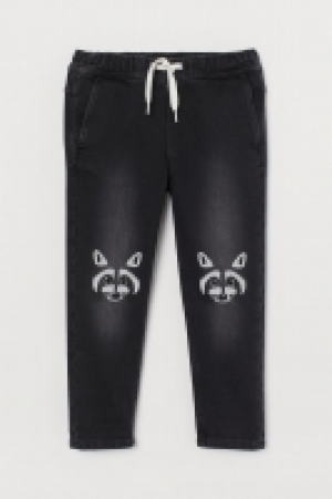 Pantalon avec applications 12.99 €