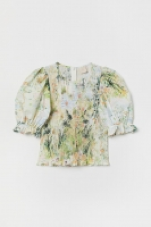 Top smocké 16.99 €