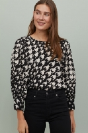 Blouse à manches bouffantes 9.99 €