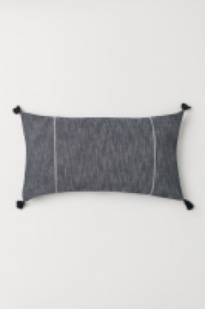 Housse de coussin à pompons 9.99 €