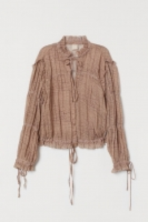Blouse à volants 21.99 €