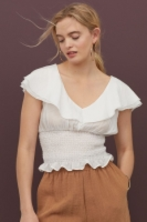 Top volanté avec smocks 8.99 €