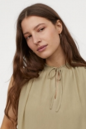 Blouse à smocks 12.99 €