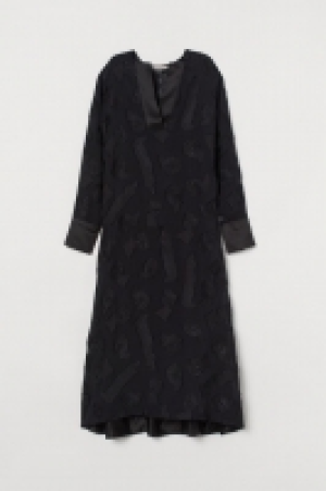 Robe en soie mélangée 128.99 €