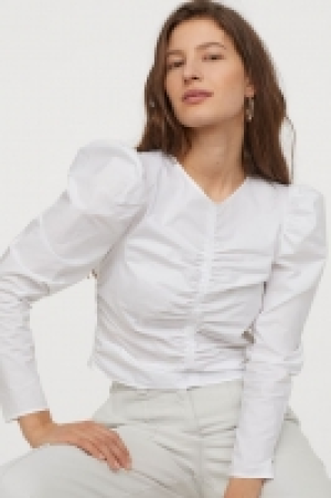 Blouse à manches bouffantes 14.99 €