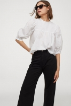 Blouse smockée en coton 14.99 €